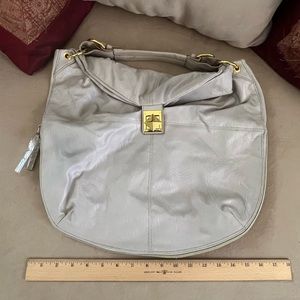 Large leather purse with gold accents
